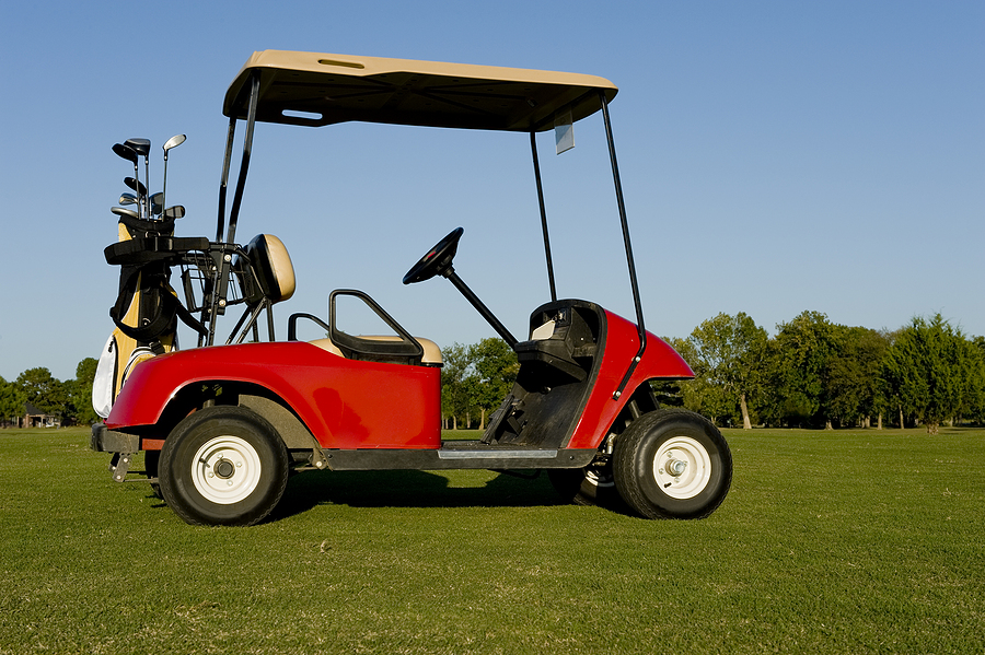 A Red Golf Cart Or Buggy